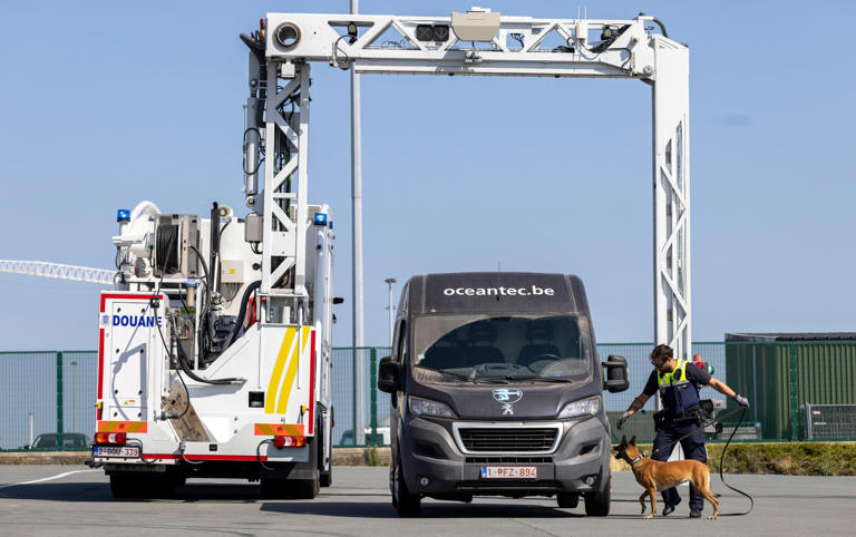 A 13ft-high mobile scanner is used to X-ray a vehicle suspected of containing contraband