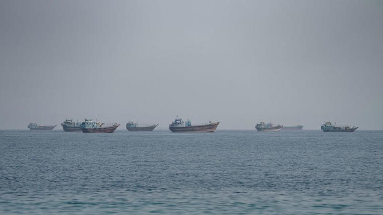 Vessels near the Strait of Hormuz, as seen from Musandam, Oman, August 24, 2026.