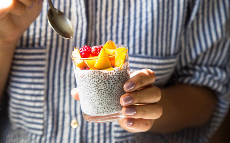 Soaking your chia seeds makes them easier to digest and can improve the absorption of nutrients (pictured: chia seeds in coconut milk with fruit)
