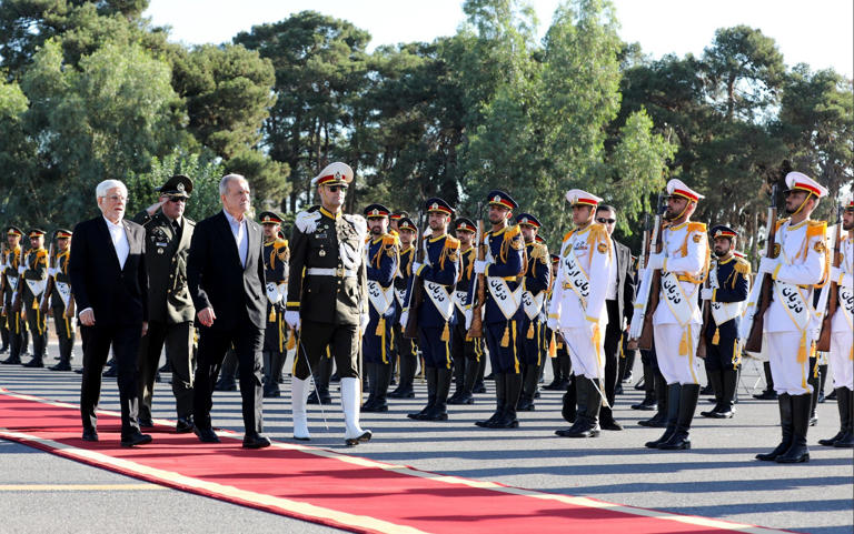 Masoud Pezeshkian, the president of Iran, is given a ceremonial sendoff at Mehr Abad airport in Tehran before leaving for New York with the delegation