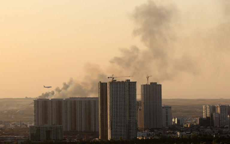 Smoke rises from the site of an explosion near the airport in Erbil on Sept 20