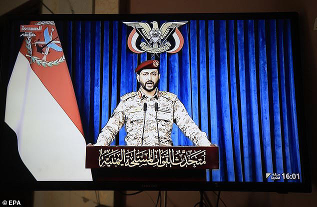 Houthi military spokesman Yahya Sarea delivers a televised statement in Sanaa, Yemen